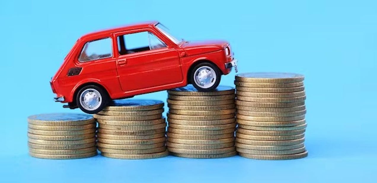 Car on a rising coin graph